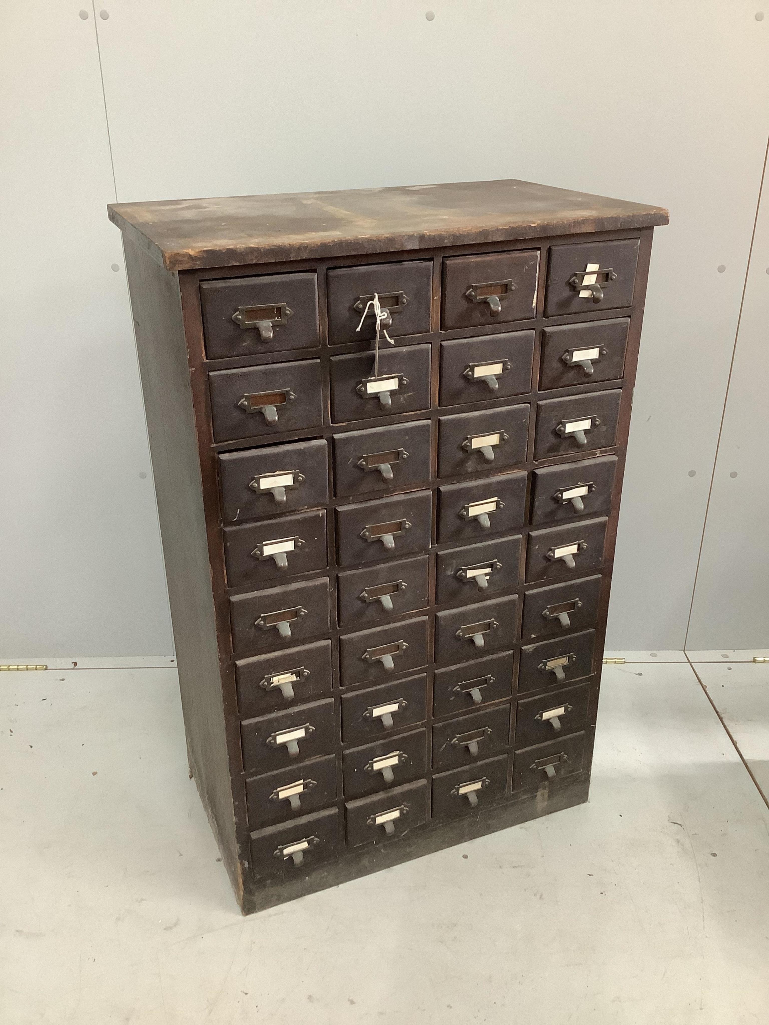 An early 20th century thirty six drawer filing cabinet, width 70cm, depth 42cm, height 108cm. Condition - fair